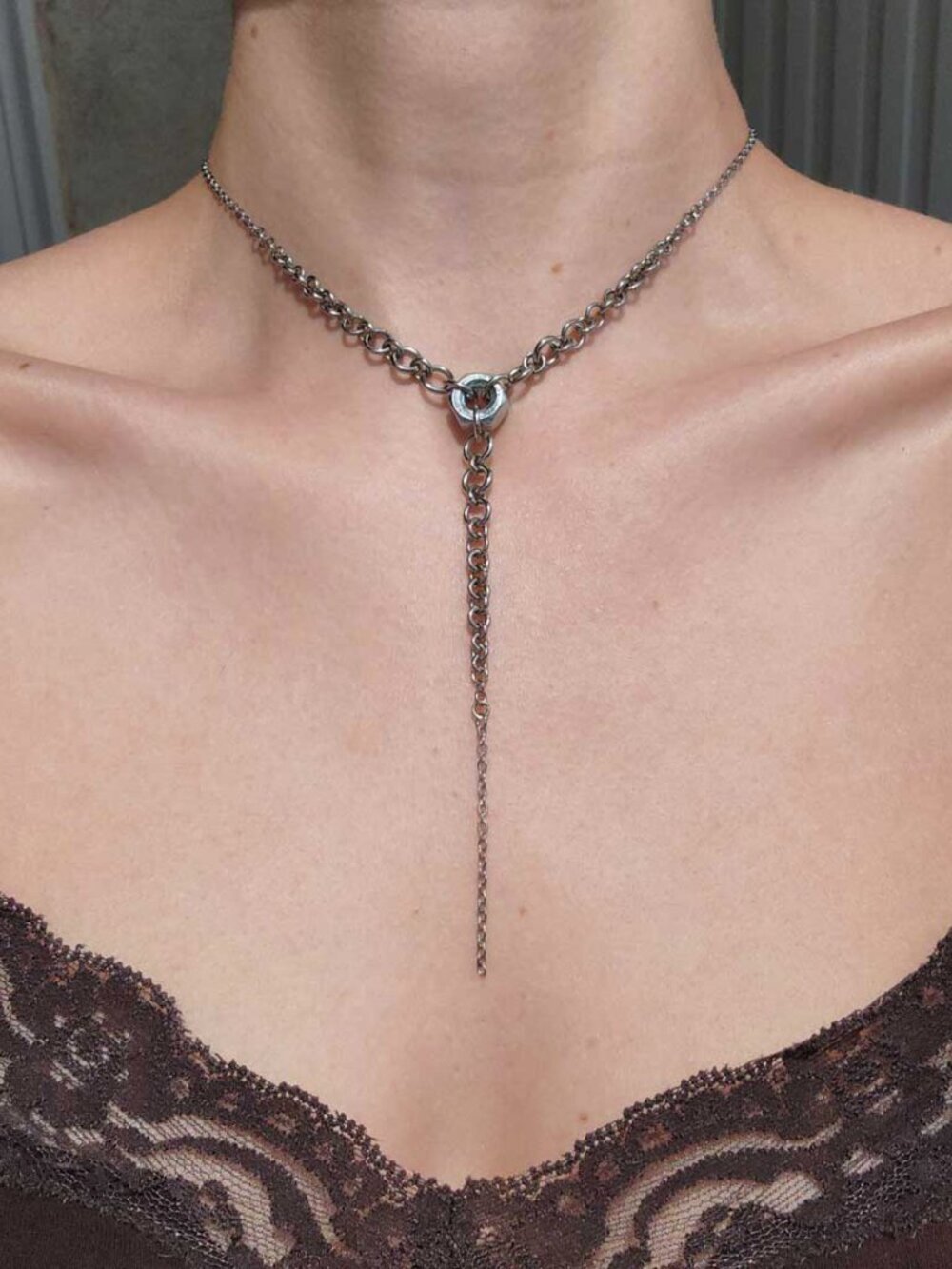 Gothic silver rosary necklace with a small silver chain